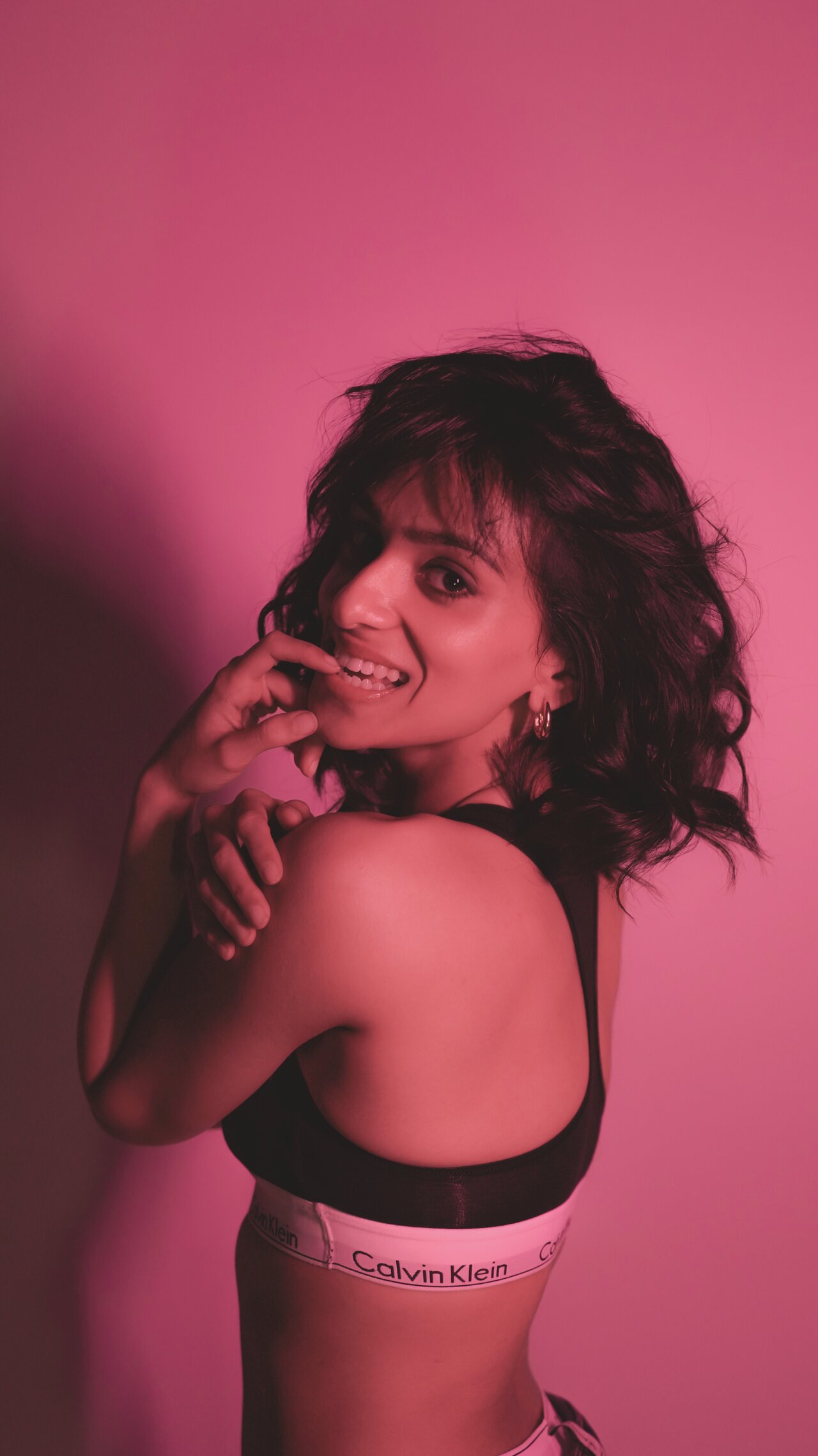 Siffaat Gandhi — pink-lit Calvin Klein editorial