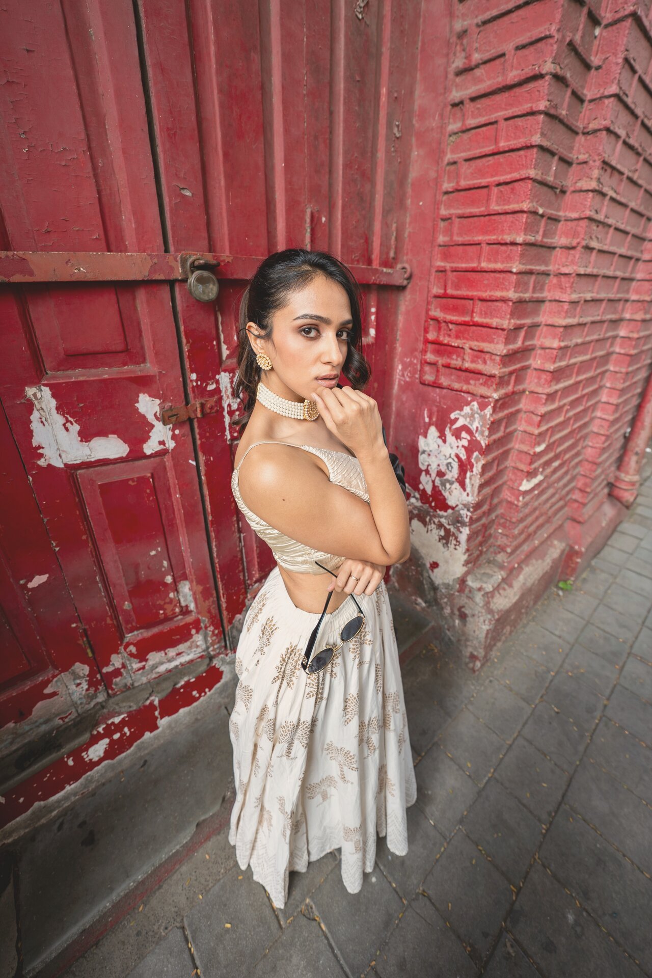 Siffaat Gandhi — red brick ethnic look, white and gold detailing
